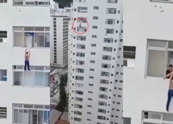Mulher escorrega e fica pendurada em prédio ao tentar limpar janela em SP; veja vídeo