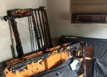 Incêndio atinge apartamento em Arcos e é controlado por moradores antes da chegada dos Bombeiros